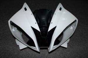 Complete and unpainted fairing in abs with front fender INJ 