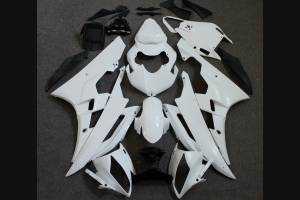 Complete and unpainted fairing in abs with front fender INJ 